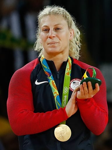 In which weight category did Kayla Harrison compete in judo?