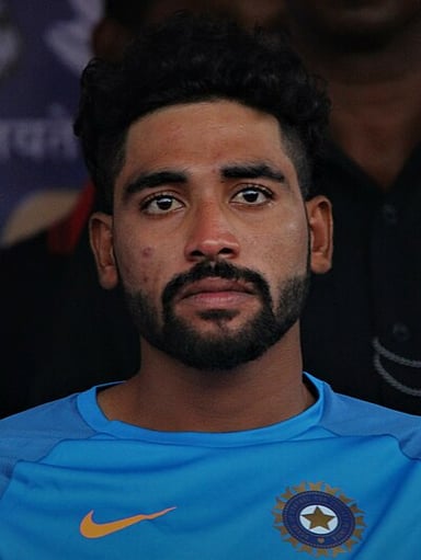 In which team did Mohammed Siraj debut in IPL?