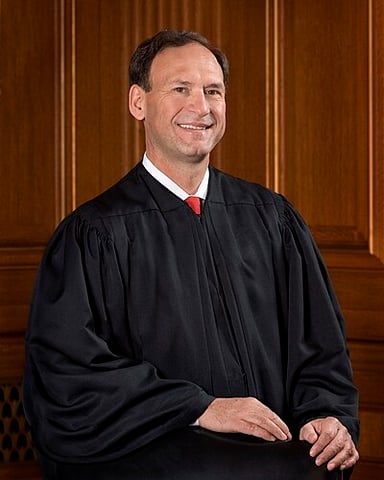 How many justices are on the Supreme Court alongside Alito?