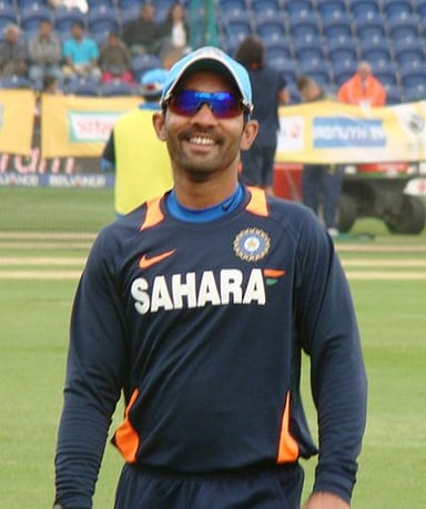 Which British channel did Dinesh Karthik work as a commentator/pundit for?