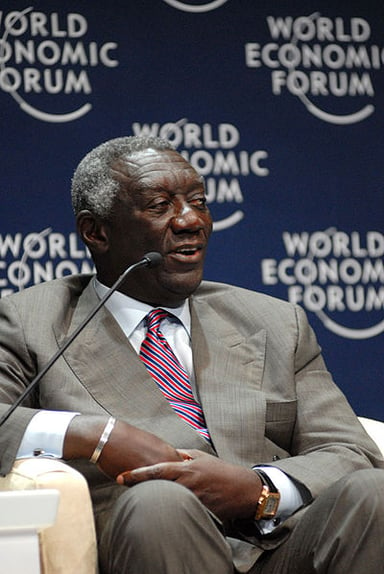 What is Kufuor's professional background besides politics?