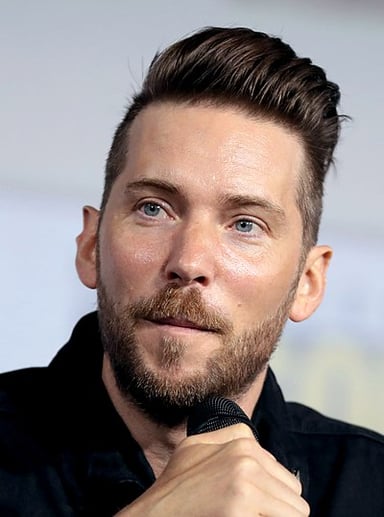 Which DC Comics character has Troy Baker voiced in various media?