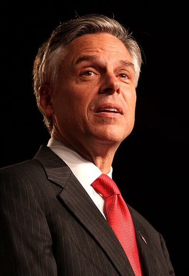 What was Jon Huntsman Jr.'s role in the George H. W. Bush administration?