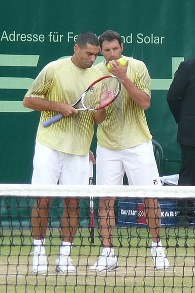 Who was Andy Ram's partner when he won at the 2006 Wimbledon Championships?