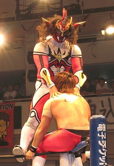 Jushin Liger's debut match was under what name?