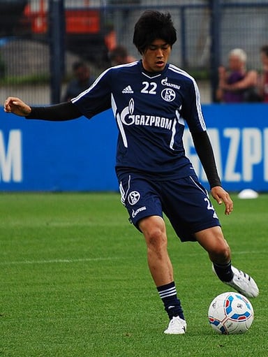 Which shirt number did Uchida typically wear while playing for Japan?