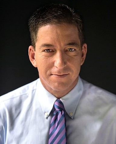 What major event led Greenwald to critique American policies?