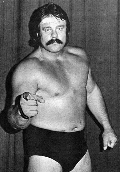 Who inducted Blackjack Mulligan into the WWE Hall of Fame?