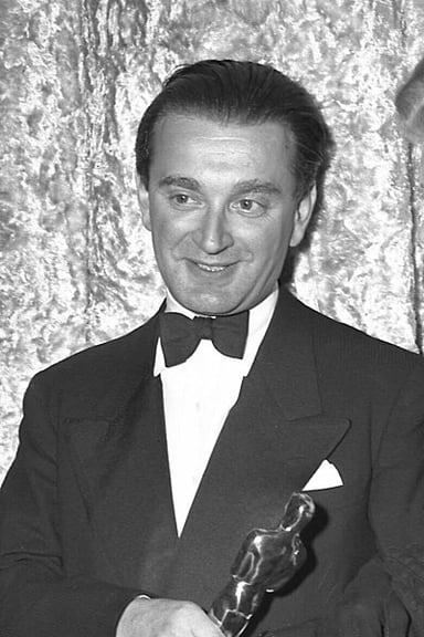 For which film did Miklós Rózsa receive his first Oscar?