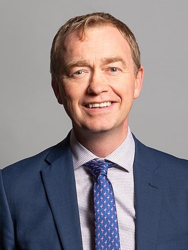 What was Tim Farron's occupation before entering politics?