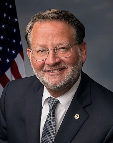 What military rank did Gary Peters hold as a reservist?