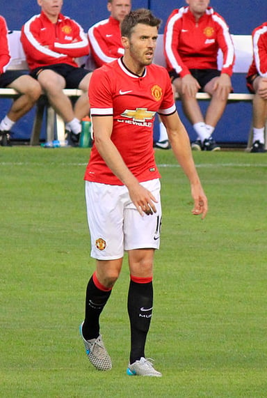 What was Michael Carrick's primary playing style known for?