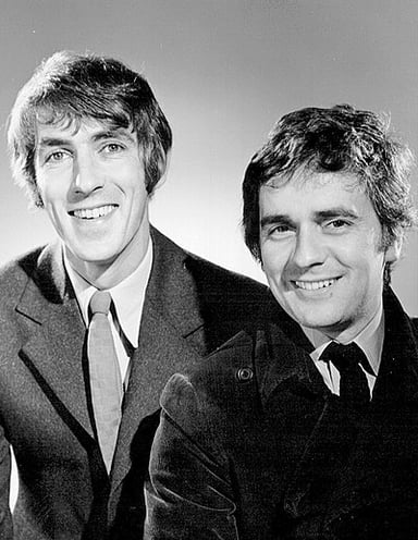 Dudley Moore was one of the four writer-performers in which comedy revue?