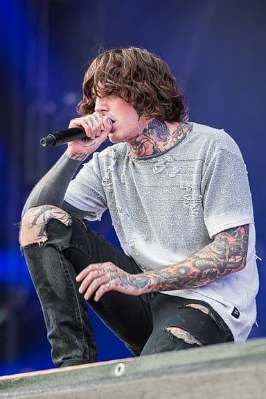 What band is Oli Sykes the lead vocalist for?