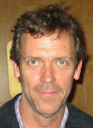 Hugh Laurie was appointed CBE in which year?
