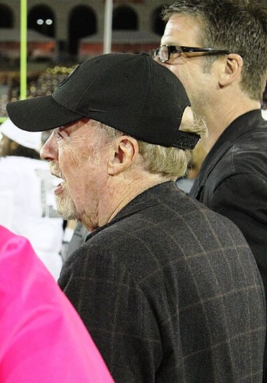 How much has Phil Knight donated to his alma maters and Oregon Health & Science University?