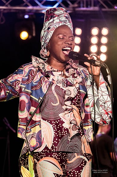 What is Kidjo's father's profession?