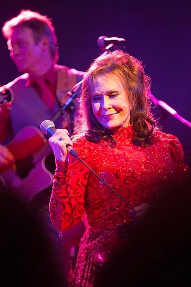 In what decade did Loretta Lynn rise to country music fame?