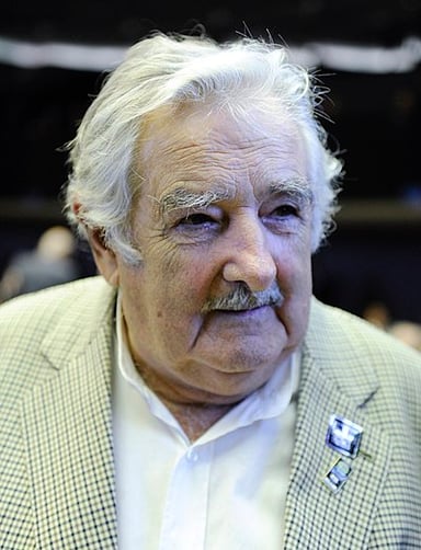 How much of his monthly salary did José Mujica donate?