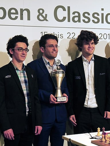 Who did Caruana lose to in the World Chess Championship?