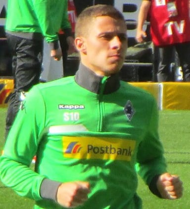 For which club did Thorgan never play a competitive match?