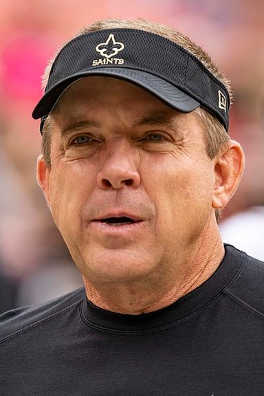 Which NFL team did Sean Payton play for as a quarterback in 1987?