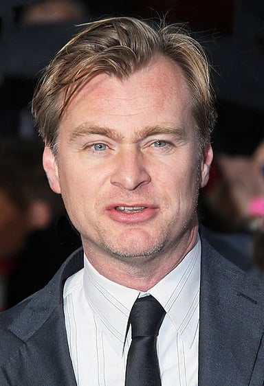 What is the name of the production company Christopher Nolan runs with his wife, Emma Thomas?