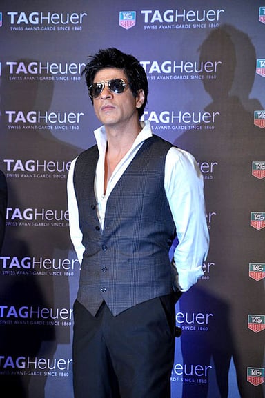Which film features Shah Rukh Khan as a man with Asperger syndrome?
