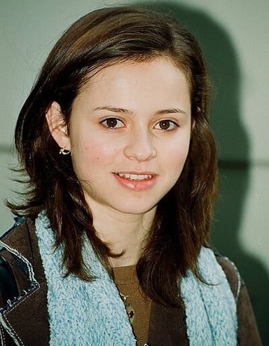 As of 2022, Sasha Cohen is the last American woman to do what?