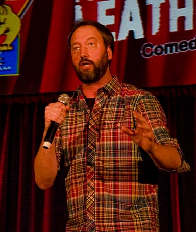 Which talk show was Tom Green's AXS TV program compared to?