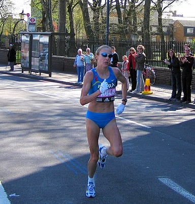 What was her Women's Marathon World Record time?