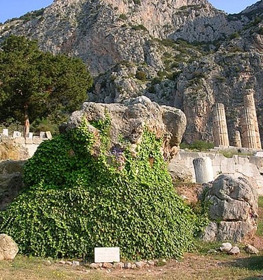What type of serpent was believed to have lived in Delphi?