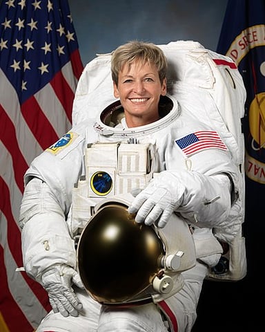 Which records does Peggy Whitson hold regarding spacewalks?