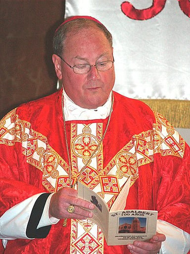 What city is Timothy M. Dolan currently the archbishop of?