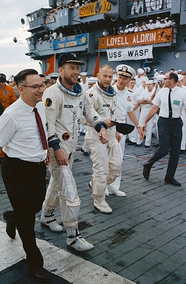 Could you select Jim Lovell's most well-known occupations? [br](Select 2 answers)