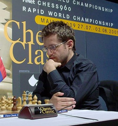 Which city hosted the 2008 Chess Olympiad won by Levon's team?