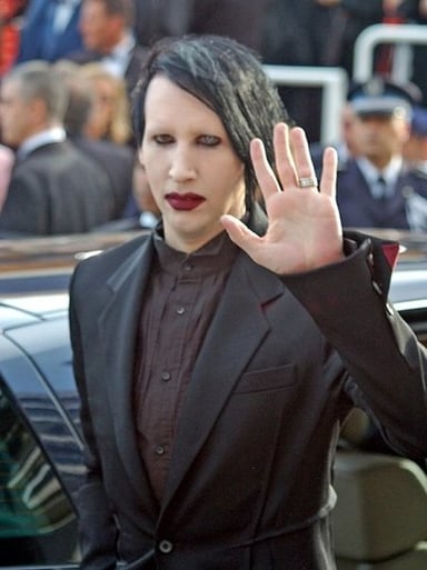 I'm curious about Marilyn Manson's most well-known professions. Could you tell me what they are? [br](Select 2 answers)