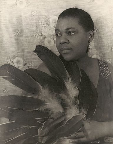 What instrument did Bessie Smith typically perform with?