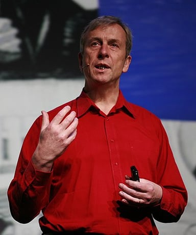 What is Kevin Warwick's leadership style often described as?