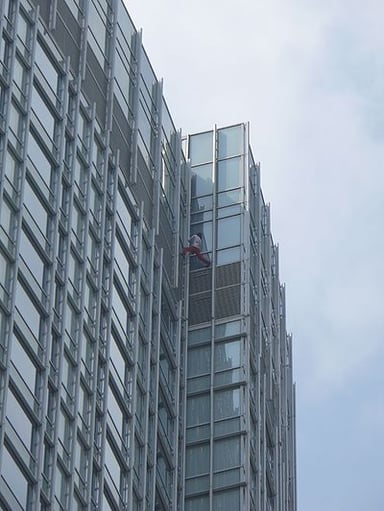 In which year did Alain Robert climb the Four Seasons Hotel Hong Kong?