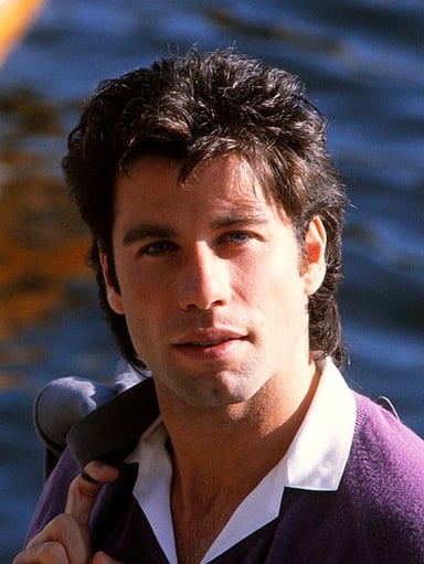 Which 1996 film features John Travolta as a man with extraordinary abilities?