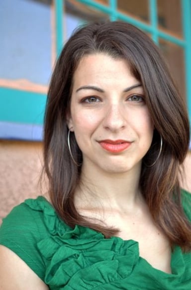What centers on Anita in discussions of video game culture?