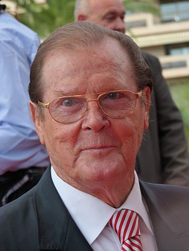 When was Roger Moore awarded the Commander Of The Order Of The British Empire?