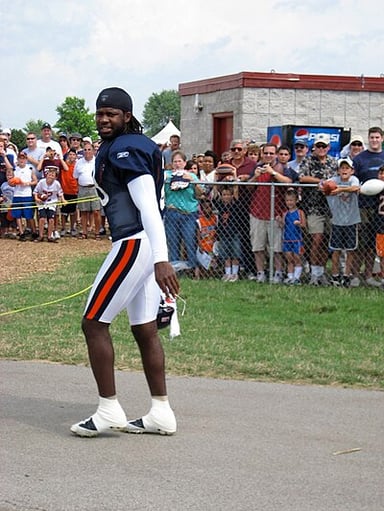 Where did Devin Hester play college football?