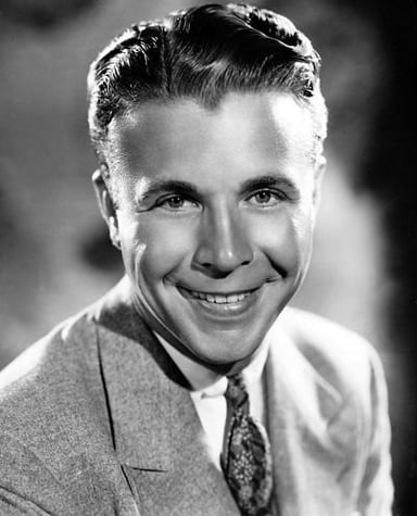 In what year did Dick Powell pass away?