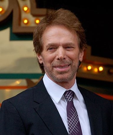 Which Bruckheimer movie features an infamous volleyball scene?
