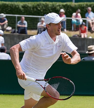 In which year did Millman achieve his career-high ATP ranking?