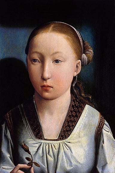 Who did Catherine of Aragon commission to write "The Education of a Christian Woman"?