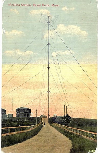 What was the nationality of the inventor who made the first AM radio transmission?