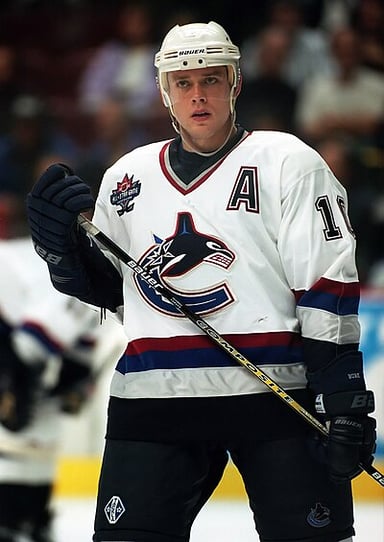 Which medal did Bure win at the 2002 Winter Olympics?